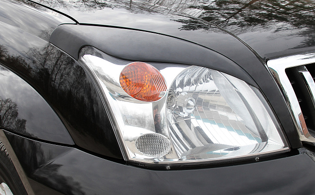 картинка Toyota LC Prado 120 2003—2009 Накладки на передние фары (реснички) компл.-2 шт. магазин  StreetTuning 