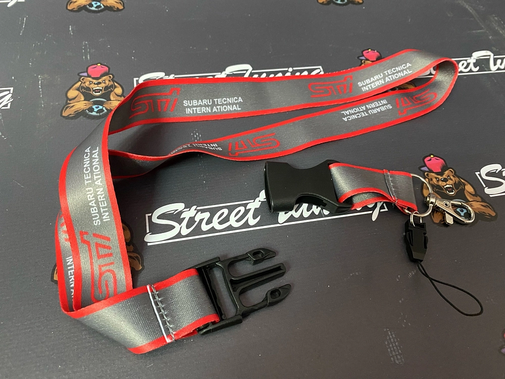 картинка Шнурок для ключей STI "тканевый", серый от магазина  StreetTuning