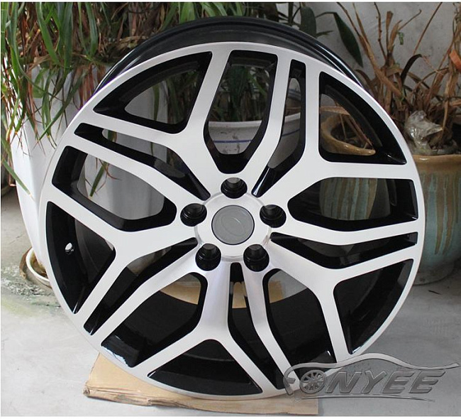 картинка Новые диски Range Rover Evoque Wheels R20 5x108 ET45 J9,5 черный глянец + серебро магазин  StreetTuning 