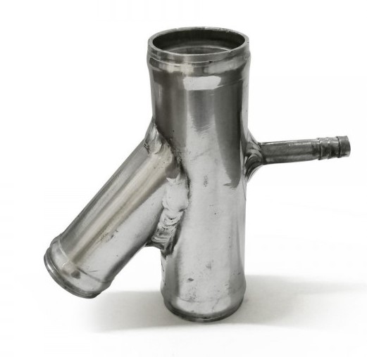 картинка Фланец (тройник) системы охлаждения VW Golf Jetta Passat 1K0121087H магазин  StreetTuning 