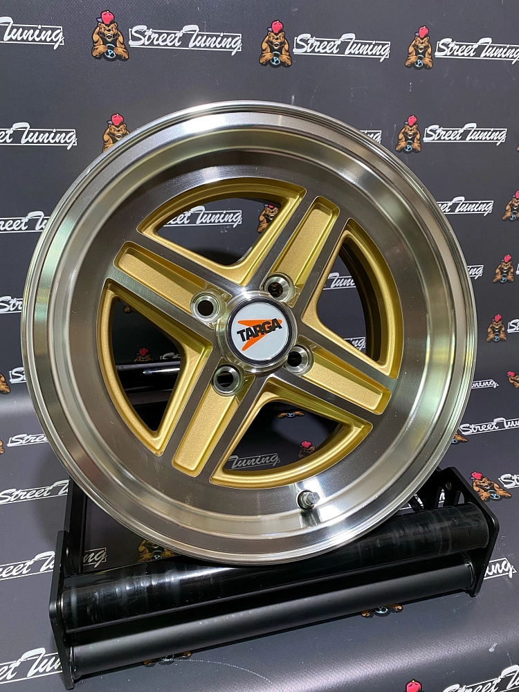 картинка Новые диски Enkei Wheels 471 R13 J7 ET7 4x98 Gold + Silver от магазина  StreetTuning
