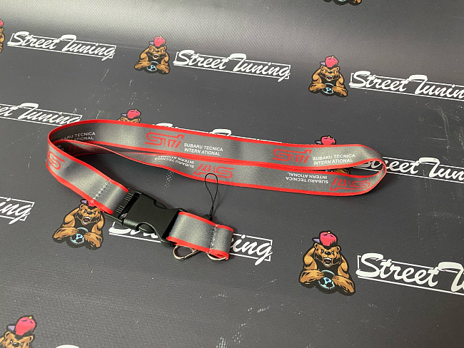 картинка Шнурок для ключей STI "тканевый", серый магазин  StreetTuning 