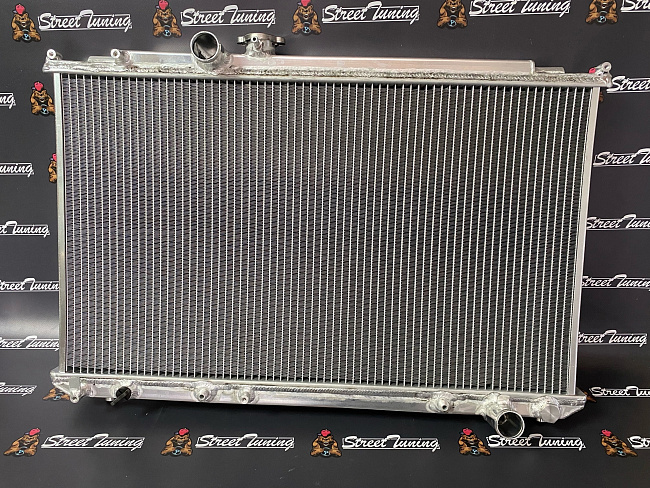 картинка Радиатор алюминиевый Toyota Mark JZX100 JZX110 1JZ-GTE 50мм AT STREETTUNING магазин  StreetTuning 