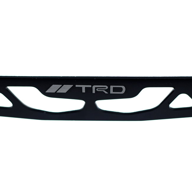 картинка Крепеж номерной рамки под углом TRD Style, цвет черный магазин  StreetTuning 