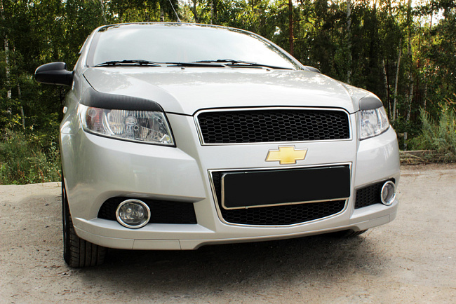 картинка Сhevrolet Aveo(хэтчбэк 3 дв.) 2008—2012 Накладки на передние фары (реснички) компл.-2 шт. магазин  StreetTuning 