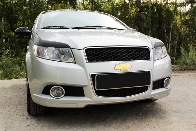 картинка Сhevrolet Aveo(хэтчбэк 3 дв.) 2008—2012 Накладки на передние фары (реснички) компл.-2 шт. магазин  StreetTuning 