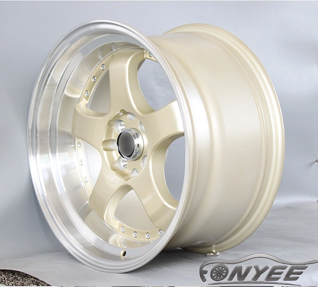 картинка Новые диски JNC 017 R17 4X100-114,3 ET25 J9 золотой + серебро магазин  StreetTuning 