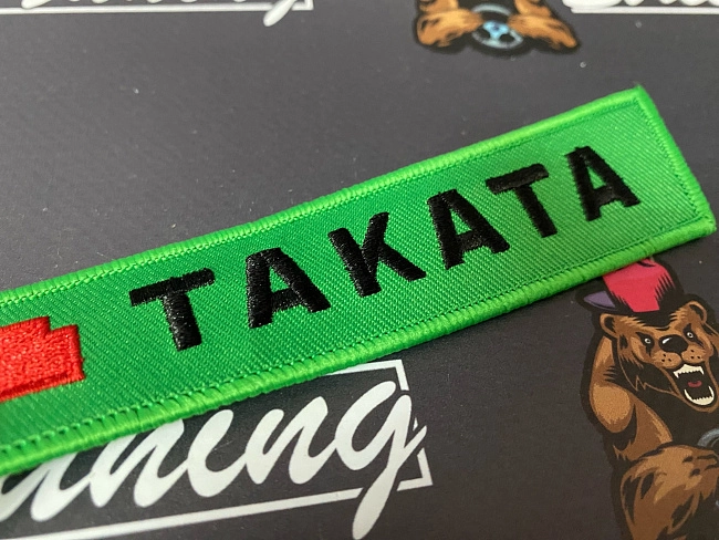 картинка Брелок для ключей TAKATA "тканевый", зеленый магазин  StreetTuning 