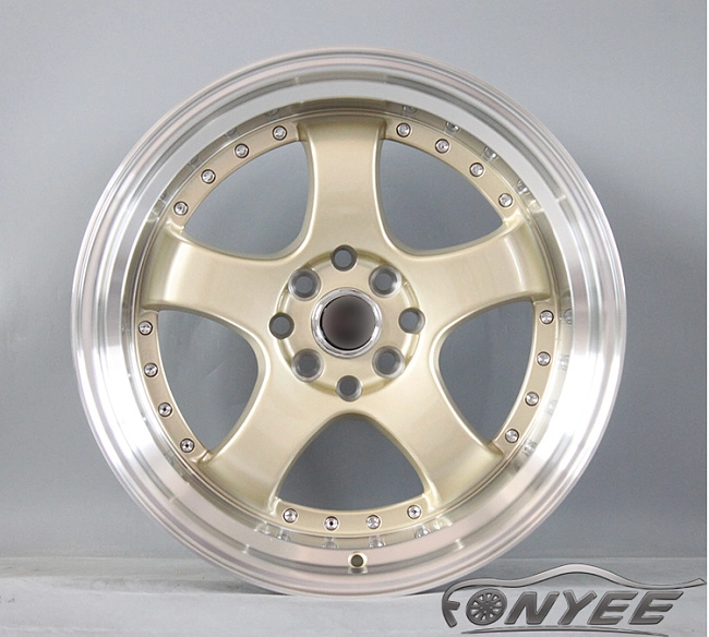 картинка Новые диски JNC 017 R17 4X100-114,3 ET25 J9 золотой + серебро магазин  StreetTuning 
