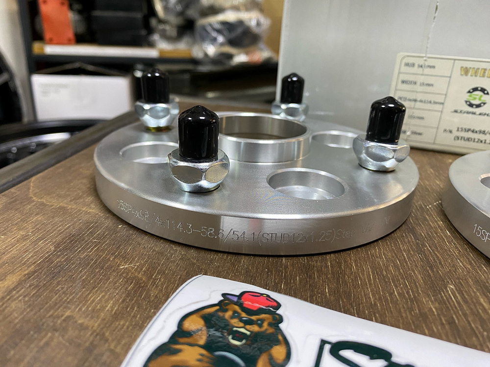 картинка Проставка переходная 15 мм 4x98-4x114.3,ЦО 58.6-54.1 шпилька 12x1.25 от магазина  StreetTuning