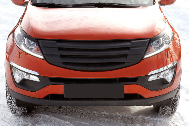 картинка Kia Sportage 2010—2013 Накладки на передние фары (реснички) компл.-2 шт. магазин  StreetTuning 