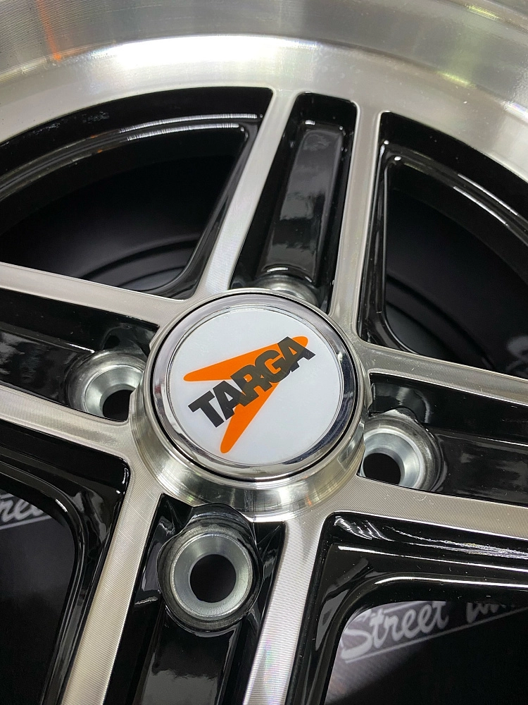 картинка Новые диски Enkei Wheels 471 R13 J7 ET7 4x98 Black + Silver от магазина  StreetTuning