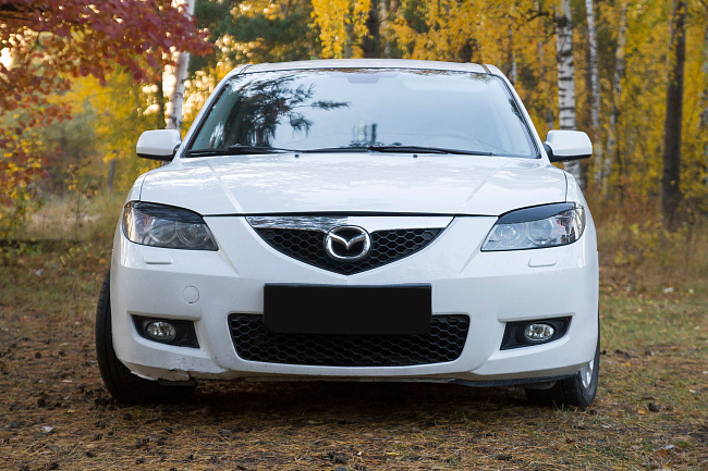 картинка Mazda 3 (седан) I (BK) Рестайлинг 2006 – 2009 Накладки на передние фары (реснички) Вариант 2 магазин  StreetTuning 