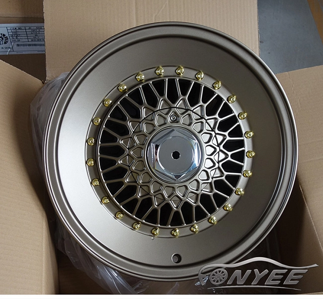 картинка Новые диски BBS RS R16 4X100/4X108 ET25 J8,5 темно золотой глянец + золотые болтики + полированная полка магазин  StreetTuning 