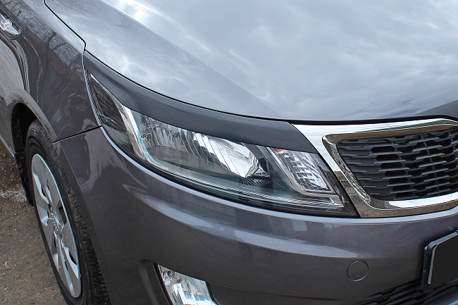 картинка Kia Rio III 2011—2015 Накладки на передние фары (реснички) компл.-2 шт. магазин  StreetTuning 