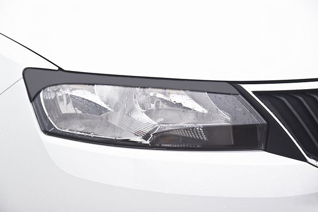 картинка Skoda Rapid 2012-2016 Накладки на передние фары (реснички) компл.-2 шт. магазин  StreetTuning 