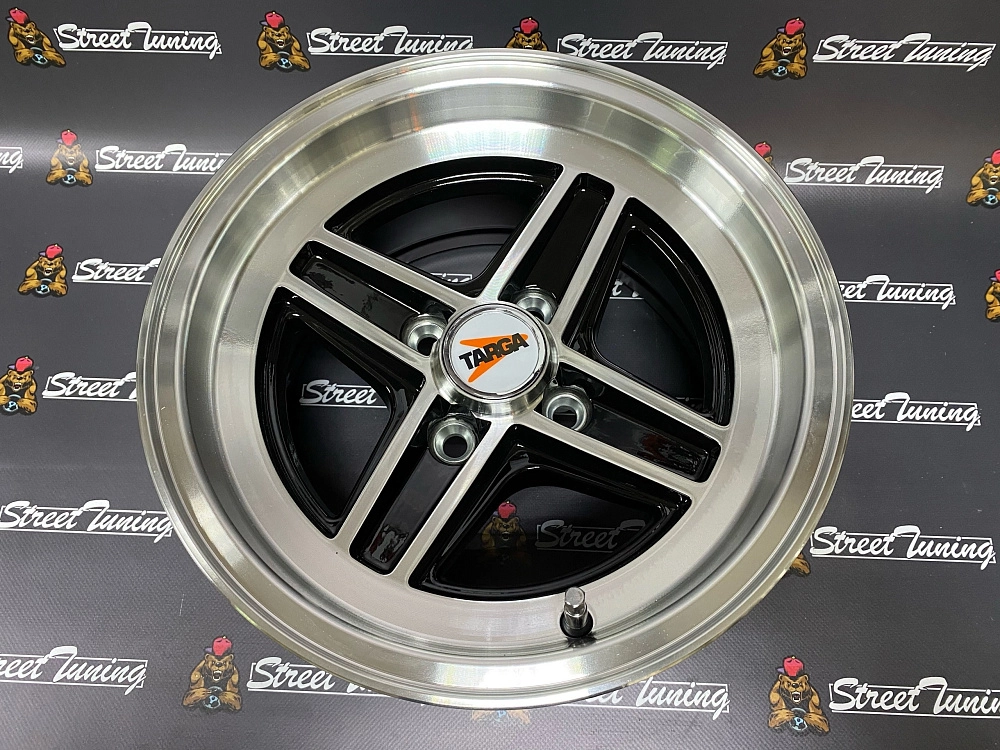 картинка Новые диски Enkei Wheels 471 R13 J7 ET7 4x98 Black + Silver от магазина  StreetTuning