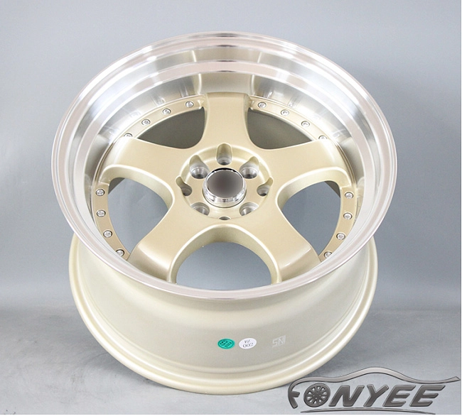 картинка Новые диски JNC 017 R17 4X100-114,3 ET35 J7,5 золотой + серебро магазин  StreetTuning 