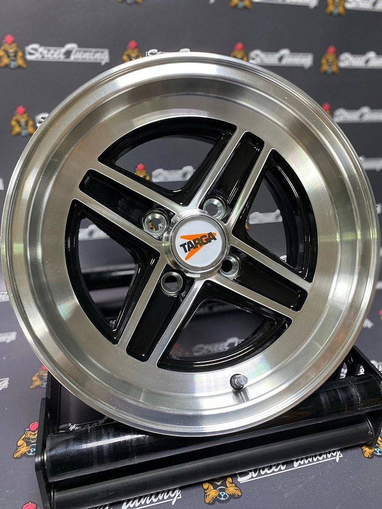 картинка Новые диски Enkei Wheels 471 R13 J7 ET7 4x98 Black + Silver от магазина  StreetTuning