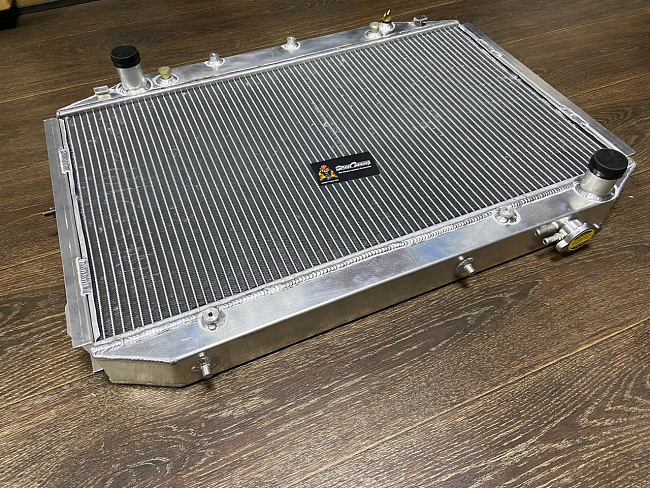 картинка Радиатор алюминиевый Toyota Land Cruiser 80 1HDFT, 1HDT, 1HZ 50мм AT магазин  StreetTuning 