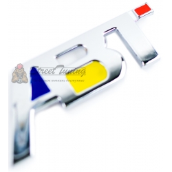 Шильдик в решетку радиатора с логотипом "ABI"