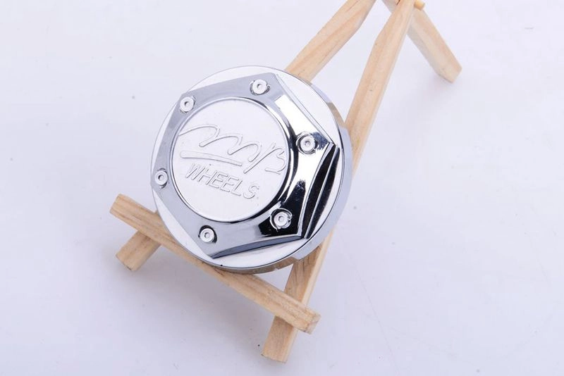 картинка Колпачок на литье хром универсальный WHEELS, С76301 (внешний 69mm, внутренний 57mm) от магазина  StreetTuning